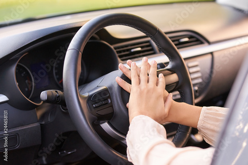 Young woman in car. Ride instruction. Automobile loan © elenavolf