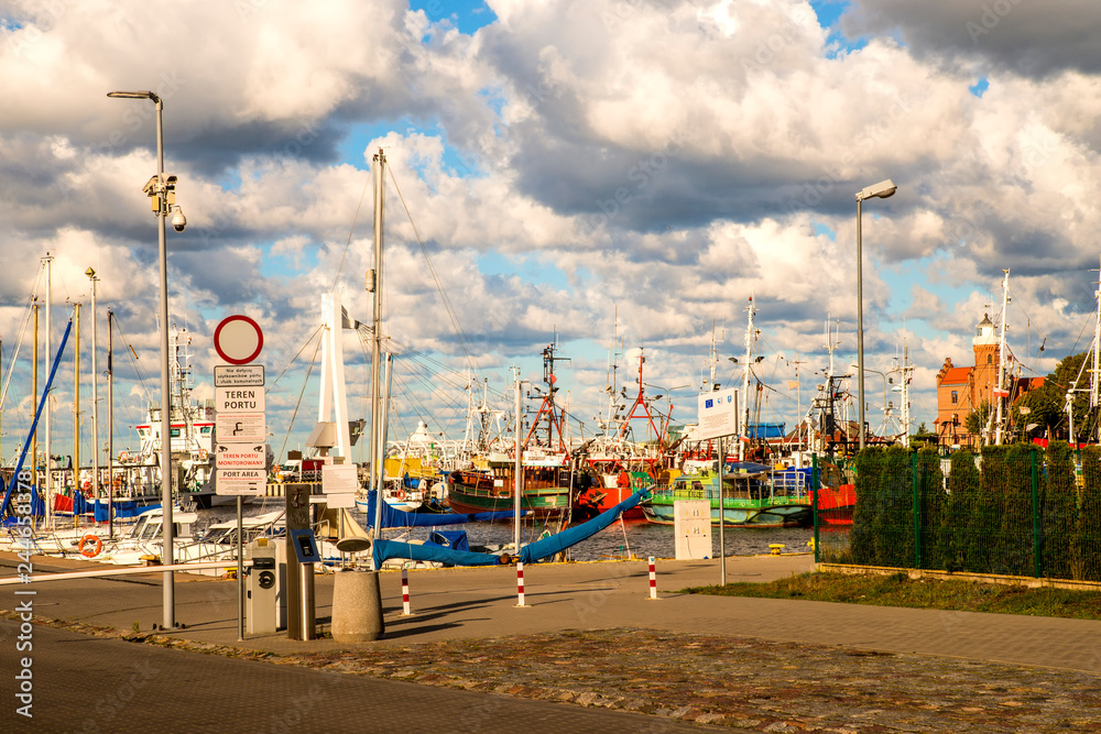 Fishing port of Ustka, Poland with old lighthouse