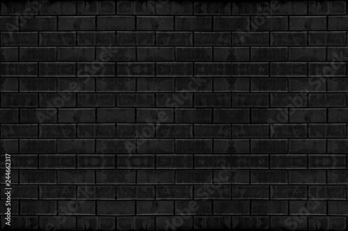 weathered old dark black cement brick blocks wall texture surface background. for any vintage design artwork.