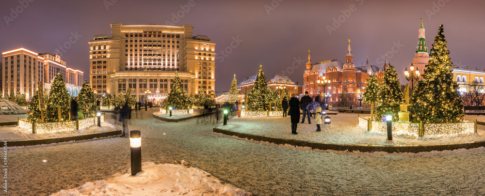 Festive New Year Illumination on the Manezhnaya square near Red square and Kremlin, Moscow, Russia.