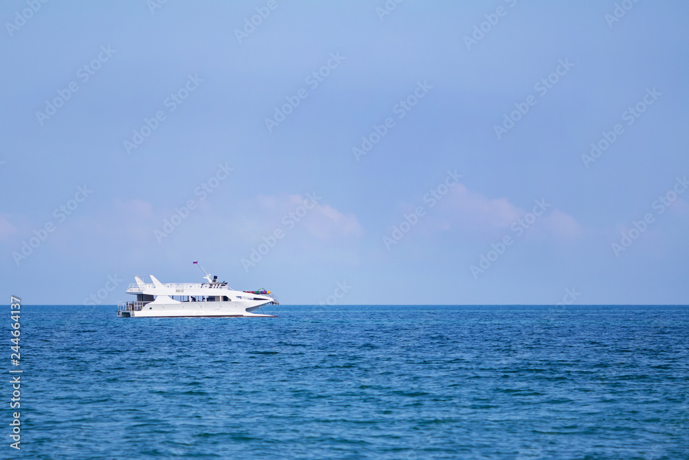 A white pleasure boat on the sea.