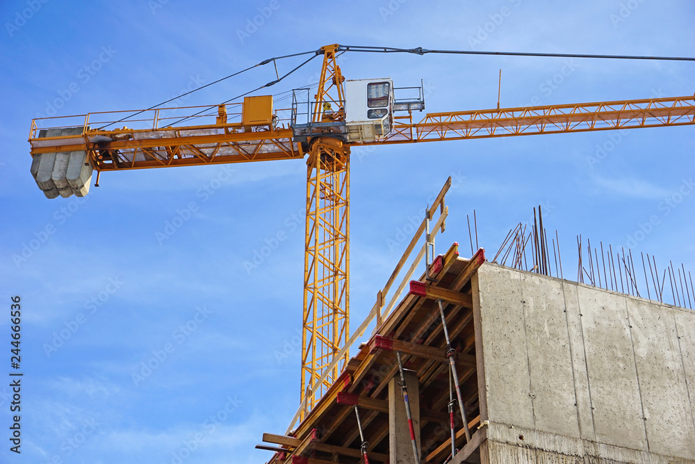 Tower crane at the construction site Tower crane at the construction site