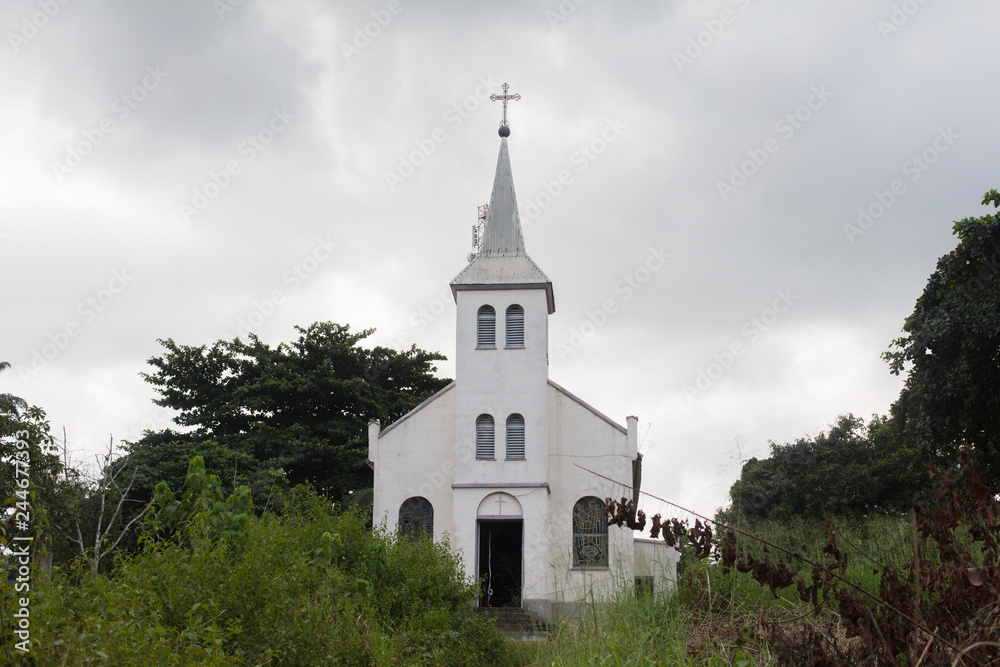 Kribi, Sud / Cameroon - February 12 2017: A colonial church outside on a hill close to the coastal town of Kribi, Cameroon.
