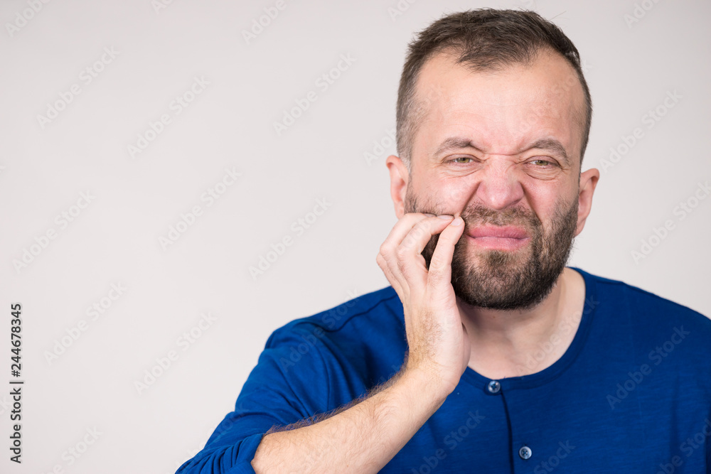 Man having tooth pain Man having tooth pain