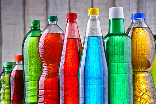 Plastic bottles of assorted carbonated soft drinks