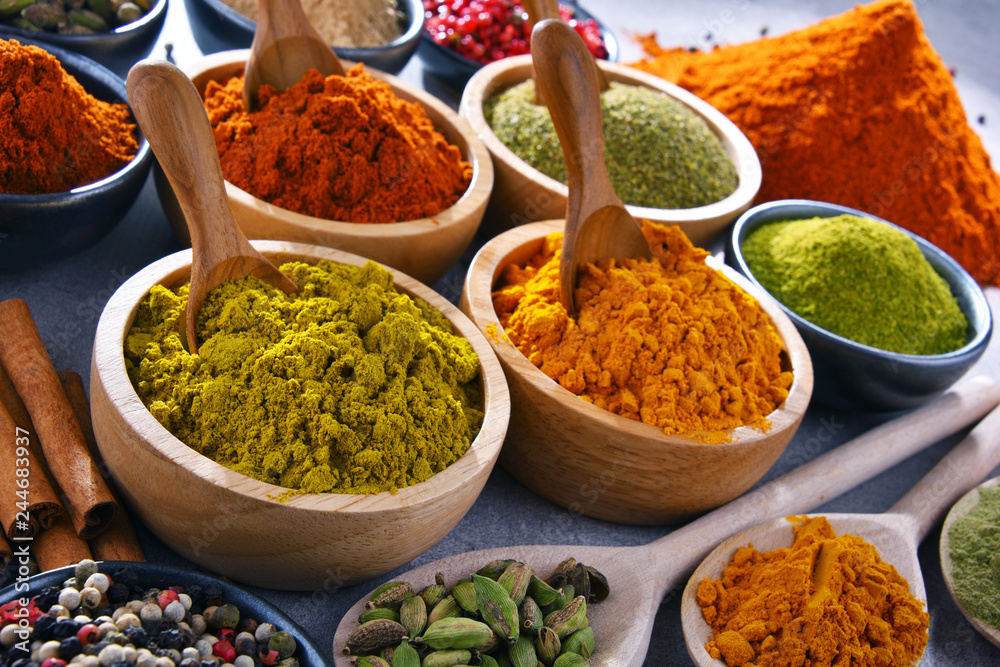 Fototapeta premium Variety of spices on kitchen table