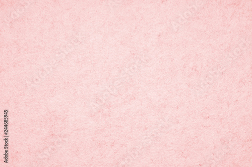 pink or coral color felt background with fiber texture