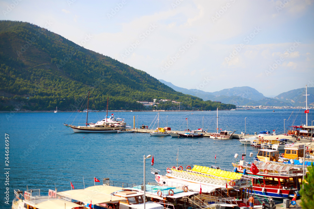 beach with boats in Icmeler Turkey