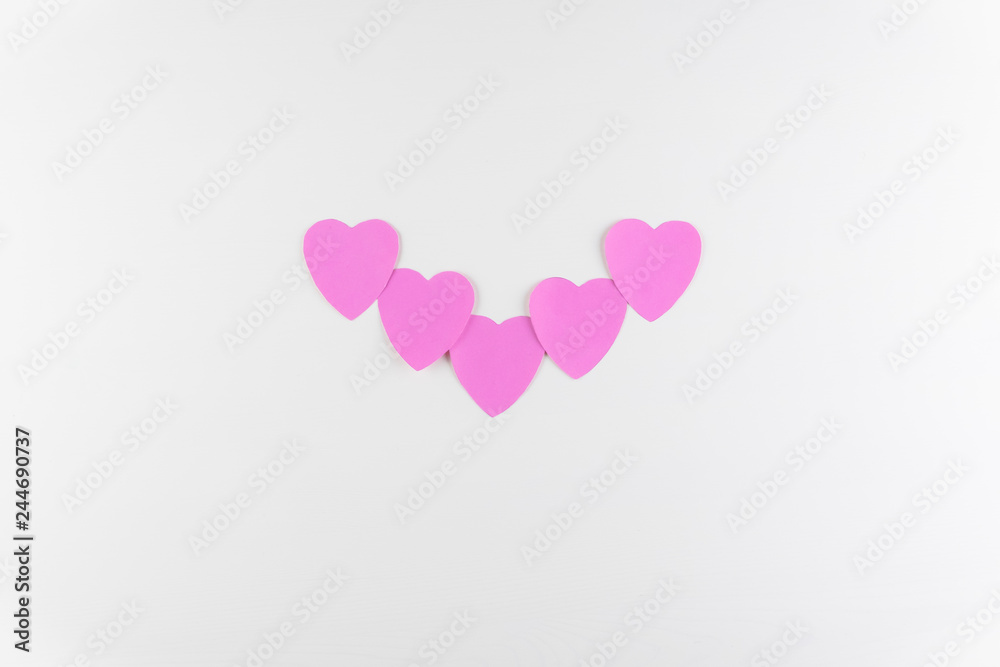 Hand-made pink love hearts isolated on white wooden texture background, Happy valentine's day. holiday background, Flat lay, top view, copy space