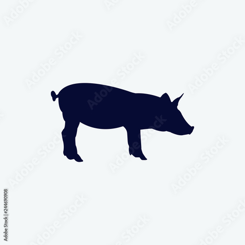 Vector silhouette of a pig on a white background.