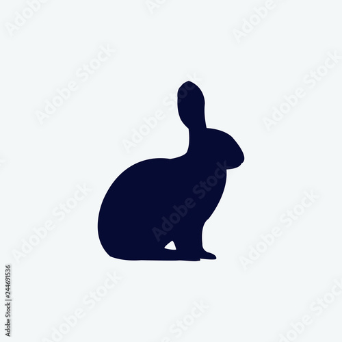 Vector silhouette of a rabbit on a white background.