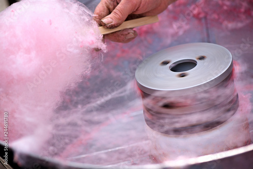 Принти на полотні Cotton candy being made out of pink dyed sugar for joyful children
