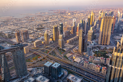 Aerial view of Dubai at sunset seen from Burj Khalifa tower, United Arab Emirates