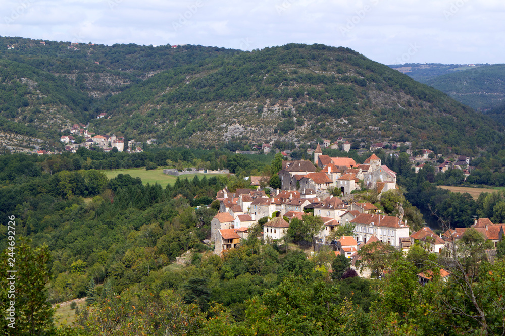 Typical rural French village of Calvignac on a hilltop in the Lot Valley, The Lot, Midi-Pyrenees, France, Europe