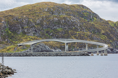 Bridge connecting Runde and Remoya two islets in front of the Norwegian coast photo