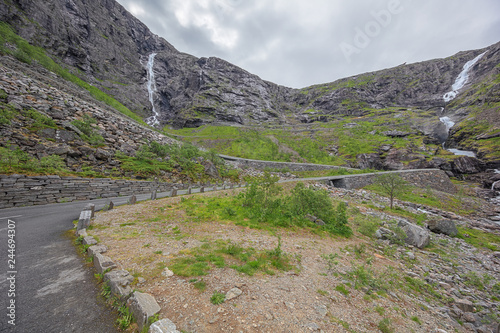 Waterfalls along the Trollstigen seen from the bottom of the valley towards Andalsnes photo