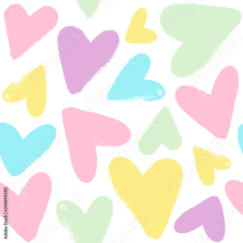 Seamless vector pattern with brush strokes hearts in pastel colors.