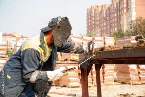 industrial worker welder during working process