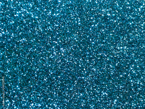 Blue sparkles. Blue glitter background. Elegant abstract background brilliant shimmer. Vector