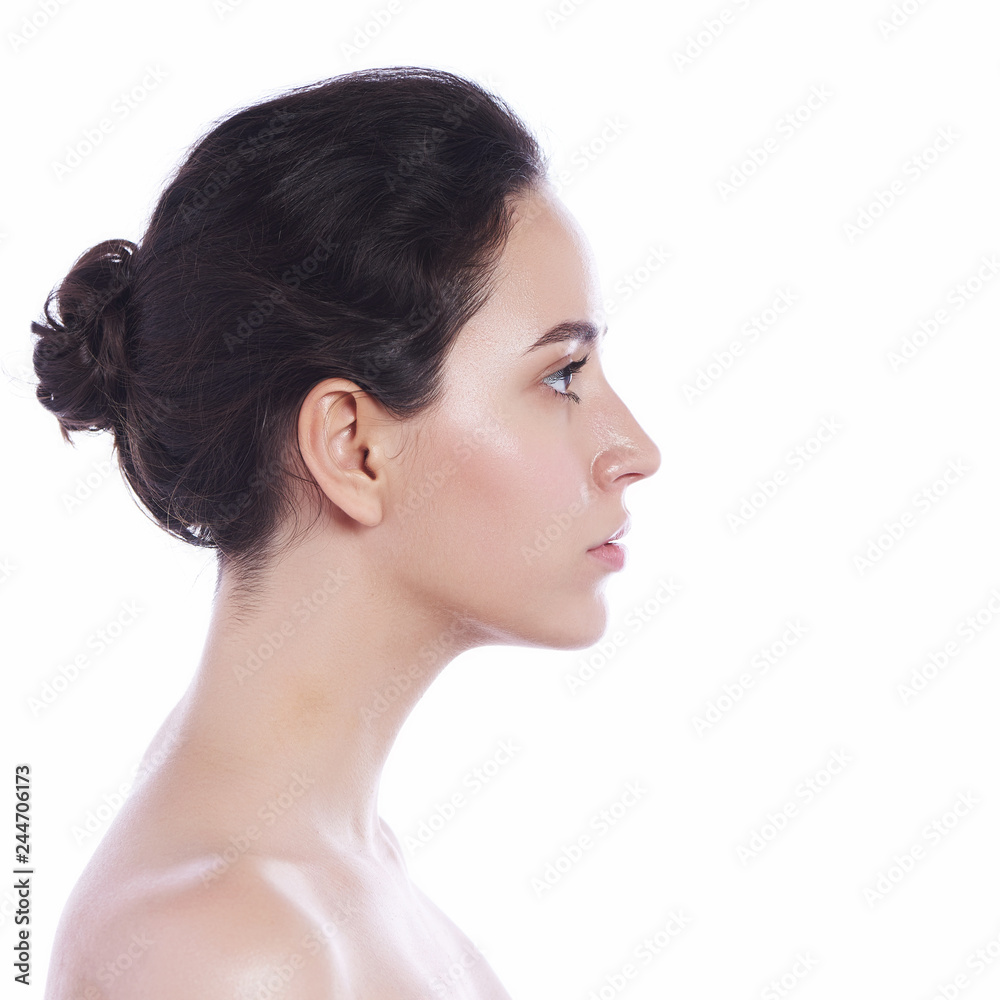 Beautiful face of young adult woman with clean fresh skin - isolated on white Beautiful face of young adult woman with clean fresh skin - isolated on white