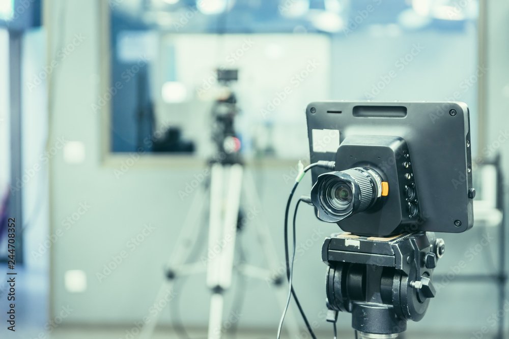 Film camera in broadcasting studio, spotlights and other equipment Film camera in broadcasting studio, spotlights and other equipment