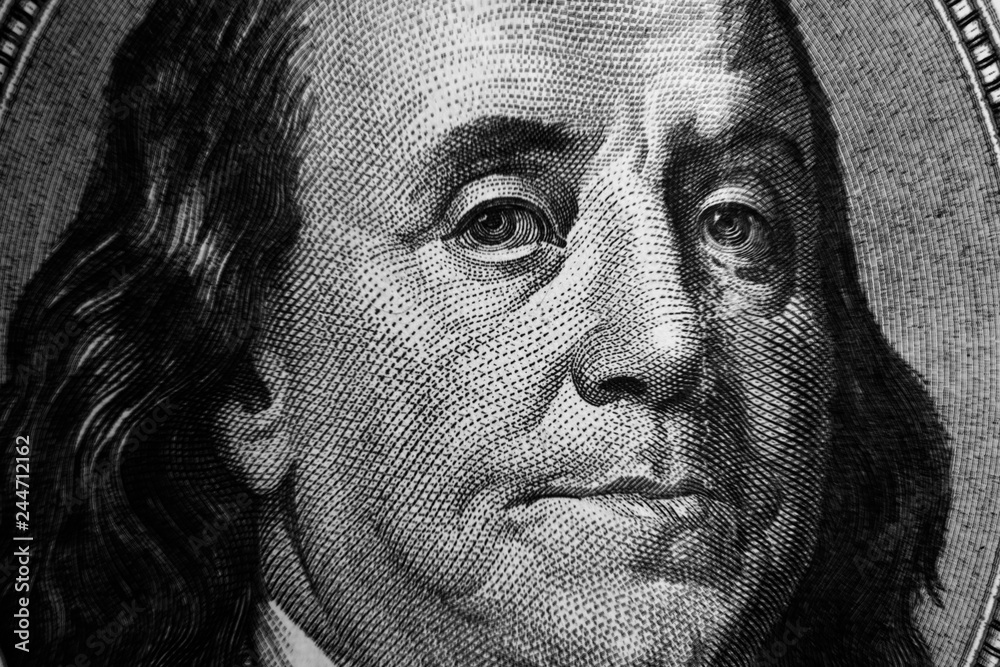 Benjamin Franklin on a dollar bill close up. Businessand finance concept. Benjamin Franklin on a dollar bill close up. Businessand finance concept.