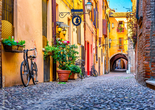 Cozy narrow street in Ferrara, Emilia-Romagna, Italy. Ferrara is capital of the Province of Ferrara