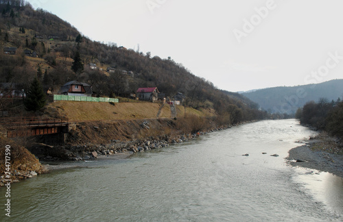 The buildings are located near the Tysa River, Ukraine photo