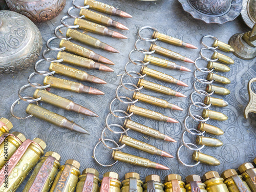 SARAJEVO, BOSNIA - MAY 11, 2017: Pens sourvenir from gun shells at market in Sarajevo photo