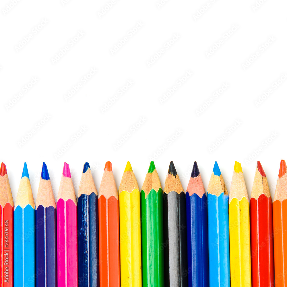Colored pencils closeup on white background. Colored pencils closeup on white background.
