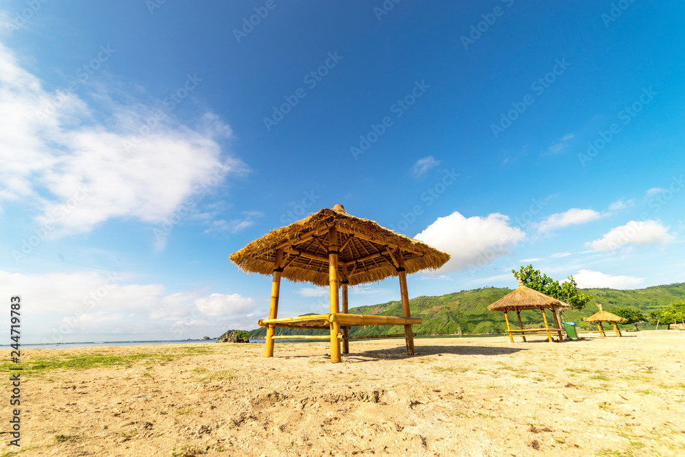 Fototapeta premium Gazebo at seashore at Lombok Island beach, Indonesia.