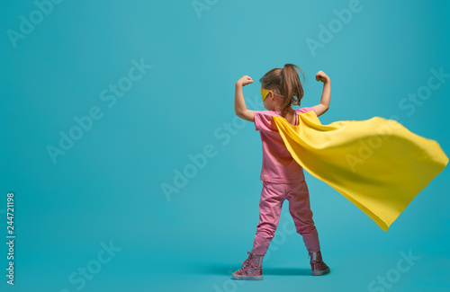 Vászonkép child playing superhero