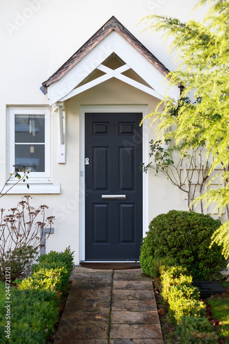 Garden Path and front door of traditional english new build house, Devon, United Kingdom, January 16, 2018