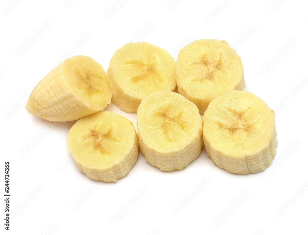 Bananas rings cut isolated on white background. Pieces, tropical fruit. Sliced. Flat lay, top view