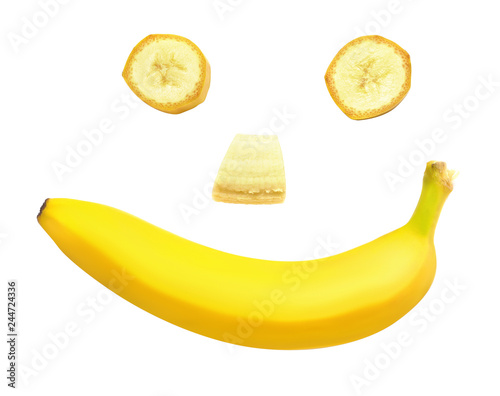 Banana clown with a slice isolated on white background. Flat lay, top view