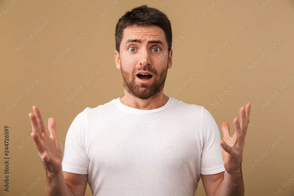 Portrait of a shocked young man casually dressed Portrait of a shocked young man casually dressed