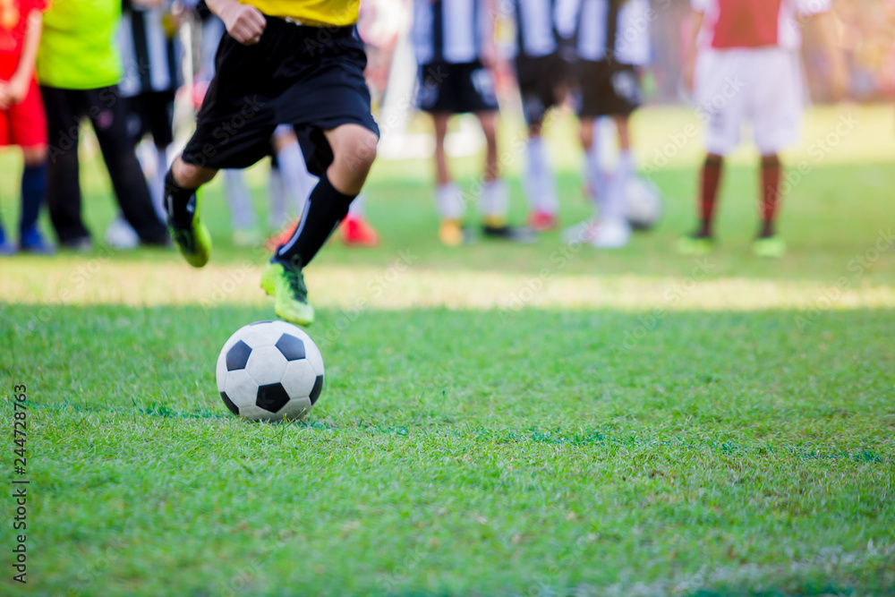 Kid soccer player do penalty shootout