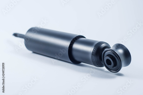 car shock absorber on white background