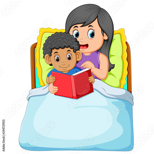the curly boy is going to sleep and reading the book with his mother 