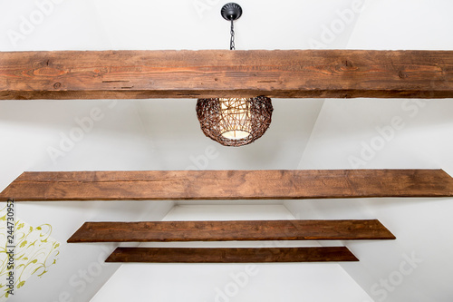 Canvas Print Stained brown decorative wooden beams in home living room white color ceiling