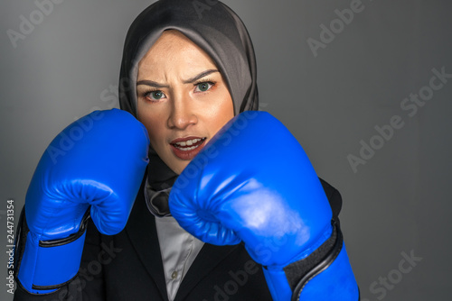 Muslimah fighter with low light view.