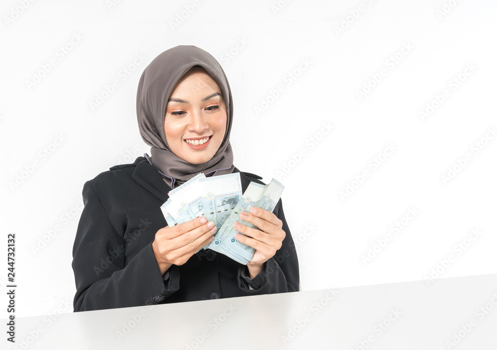 Hijab businesswoman and money with white background. Hijab businesswoman and money with white background.