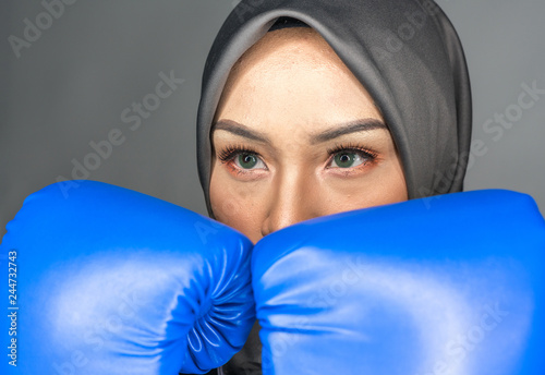 Muslimah fighter with low light view.