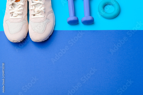 Fitness Gym equipment on color background