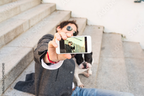 Man making a selfie with his dog