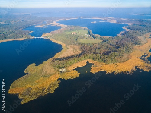 Aerial view of beautiful landscape of lake district, bridge between Dargin and Kirsajty Lakes, next Mamry Lake, Mazury, Poland photo