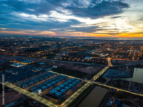 Aerial view of residential township during sunset. © mawardibahar