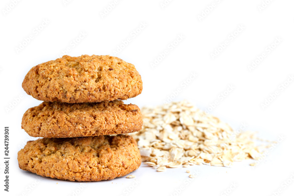Isolated oatmeal cookies and cereals on a white background Isolated oatmeal cookies and cereals on a white background