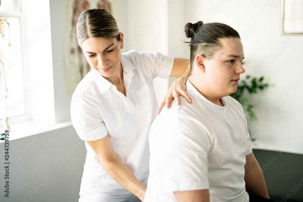 A Modern rehabilitation physiotherapy woman worker with client