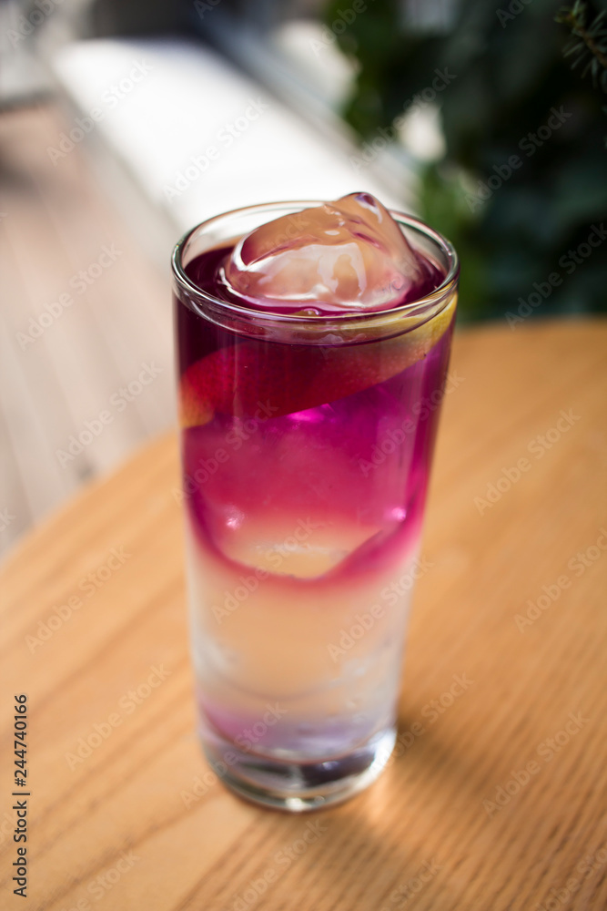 lavender lemonade with ice on the windowsill on a hot sunny day lavender lemonade with ice on the windowsill on a hot sunny day